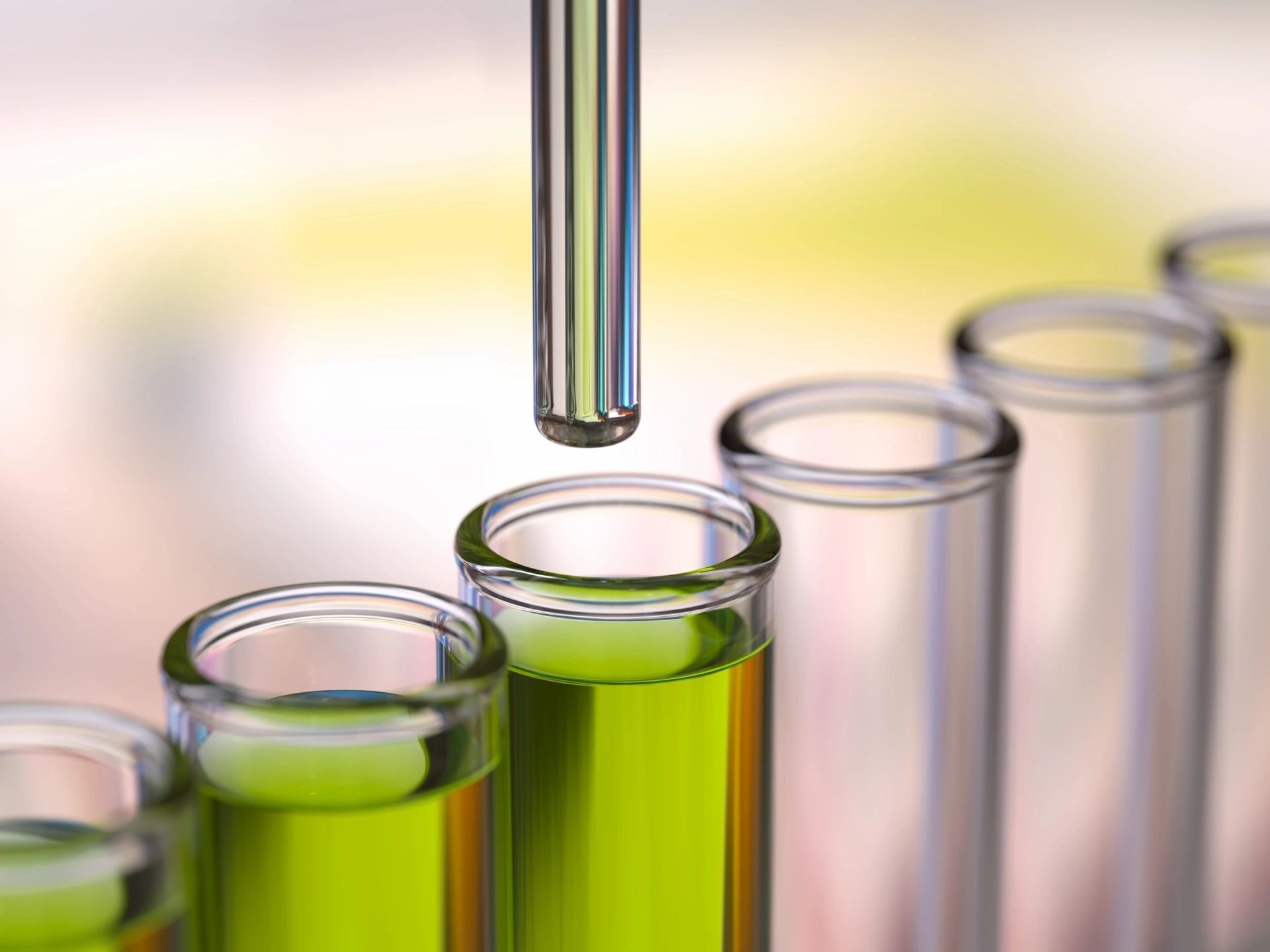 Laboratory test tubes with green liquid